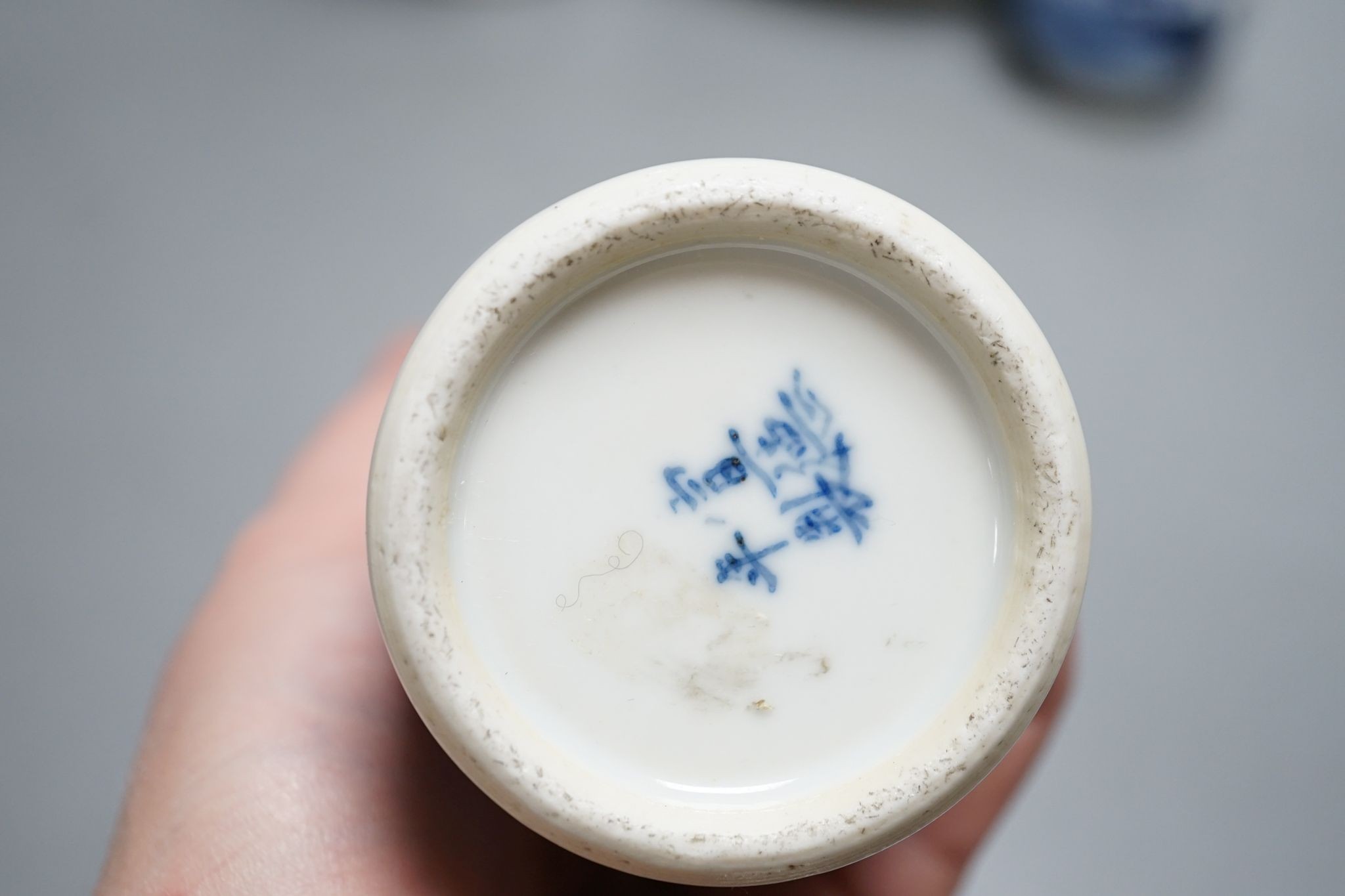 Twelve pieces of 19th century Chinese blue and white tableware and a small famille rose bowl, largest 20cm